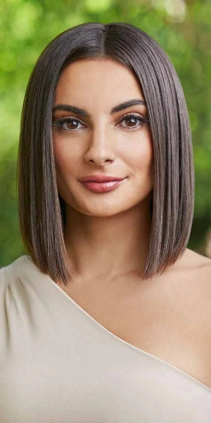 Стрижка ниже плеч с челкой