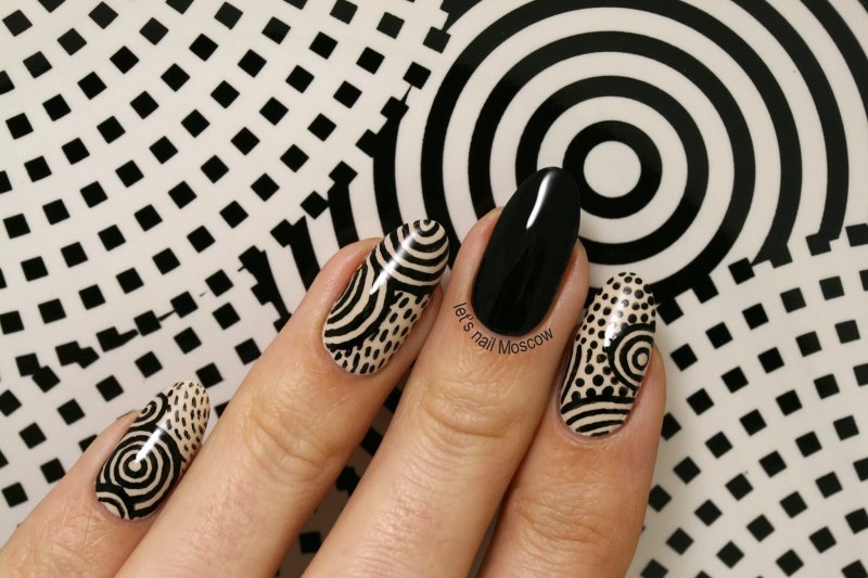 Черные узоры на ногтях