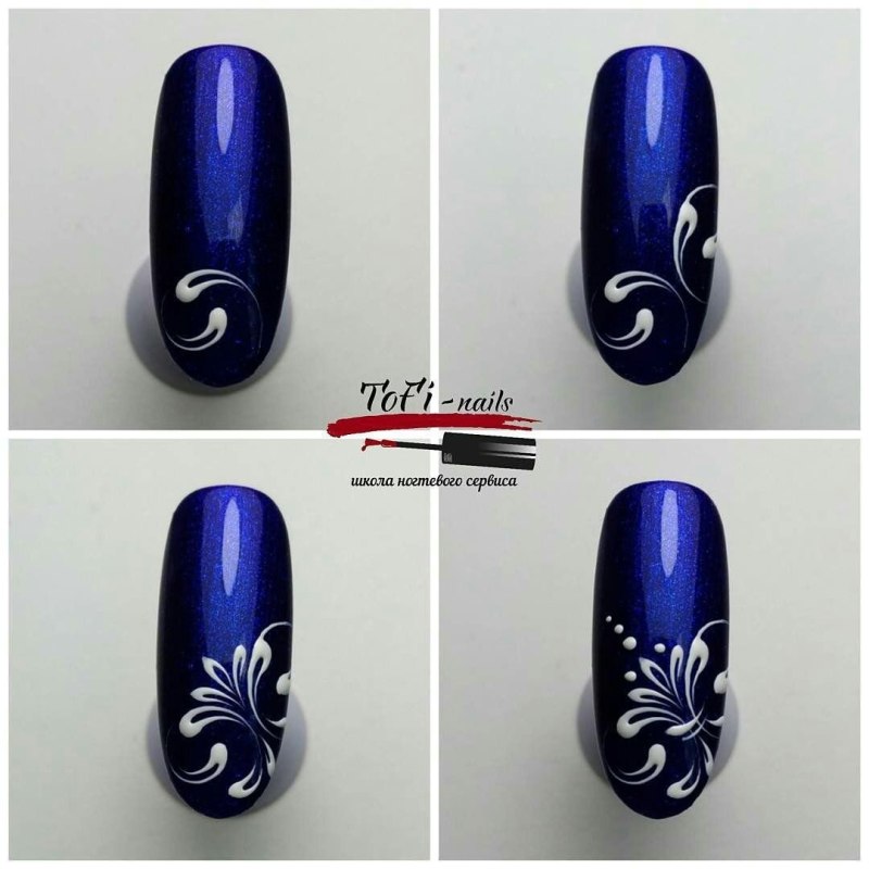 Маникюр синий с белыми вензелями