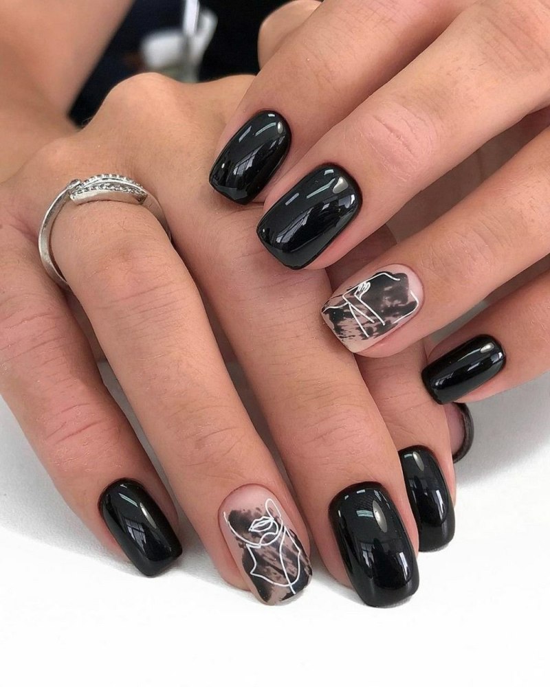 Маникюр оранжевый с черным